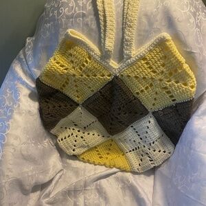 Handmade, crocheted tote bag.  Large size; multicoloured.  Washable acrylic yarn